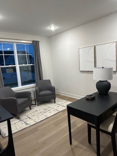 home office featuring hardwood / wood-style flooring