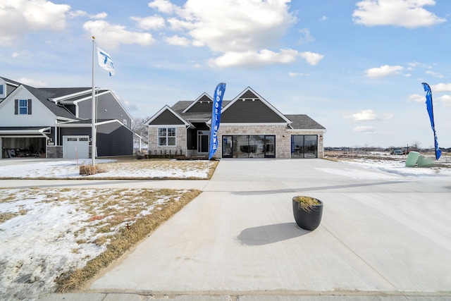 exterior space featuring a garage and concrete driveway