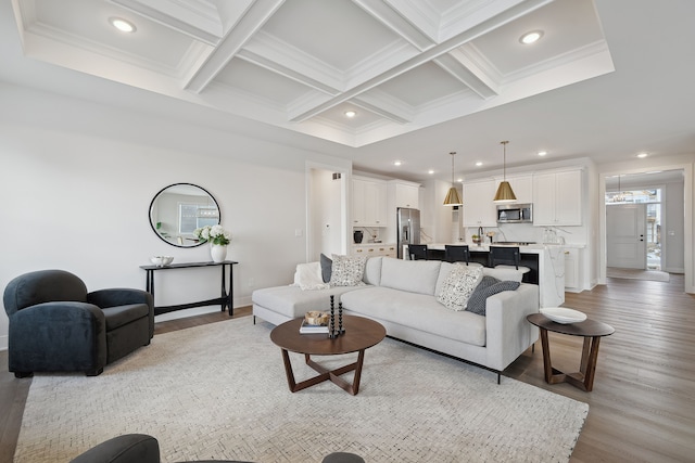 living room featuring light wood-style floors, coffered ceiling, beamed ceiling, and recessed lighting