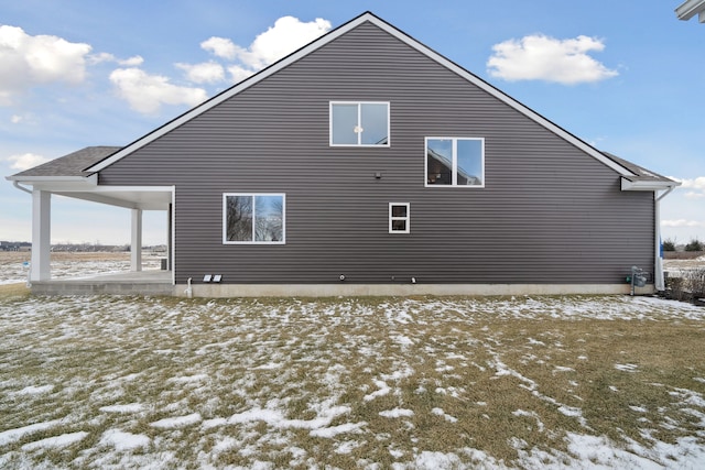 view of snow covered property