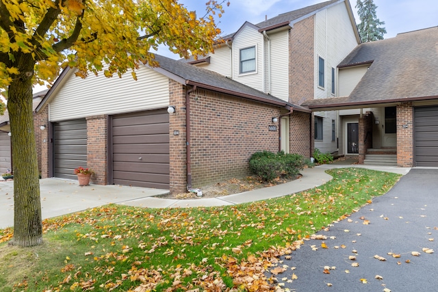 view of front of property with a garage