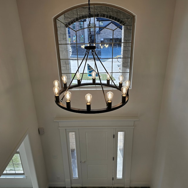 interior space featuring a notable chandelier