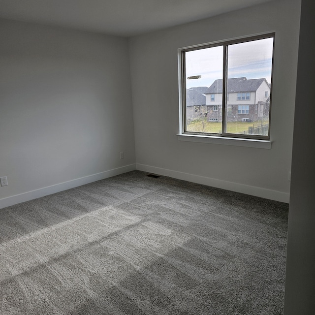 view of carpeted spare room