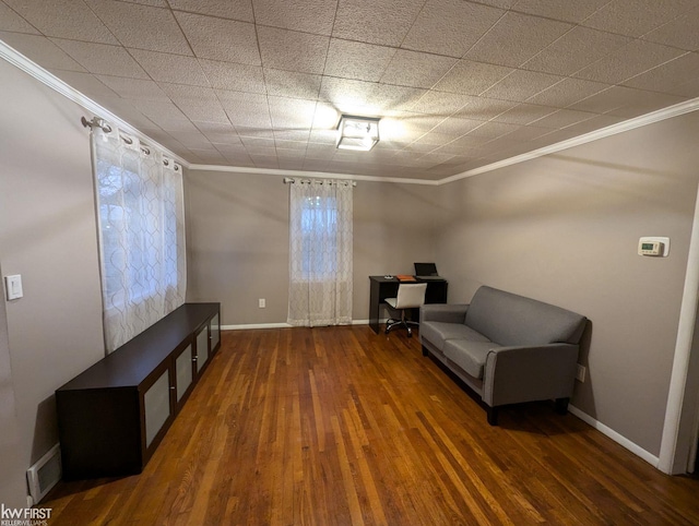 unfurnished room with crown molding and dark hardwood / wood-style flooring