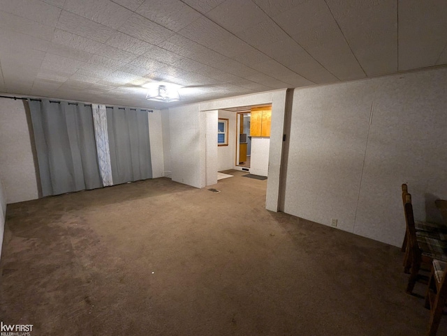 basement featuring carpet