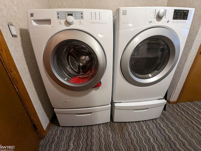 laundry room with independent washer and dryer