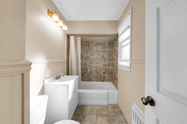 full bathroom with radiator, vanity, toilet, and shower / bathtub combination with curtain