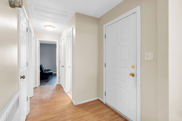 hallway featuring light hardwood / wood-style flooring