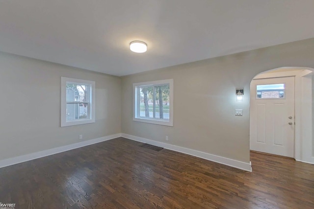 foyer featuring dark hardwood / wood-style floors