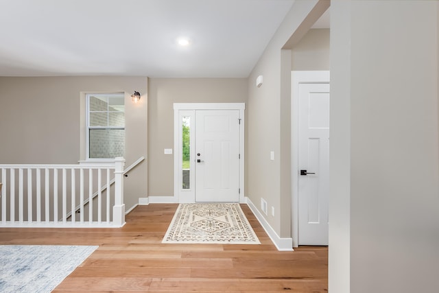 entrance foyer featuring hardwood / wood-style floors