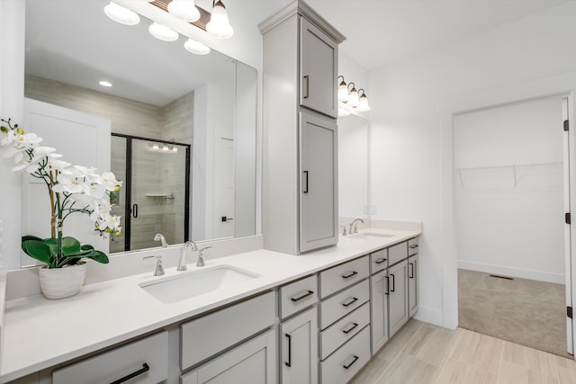 bathroom featuring vanity and walk in shower