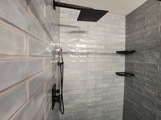 interior space with a tile shower