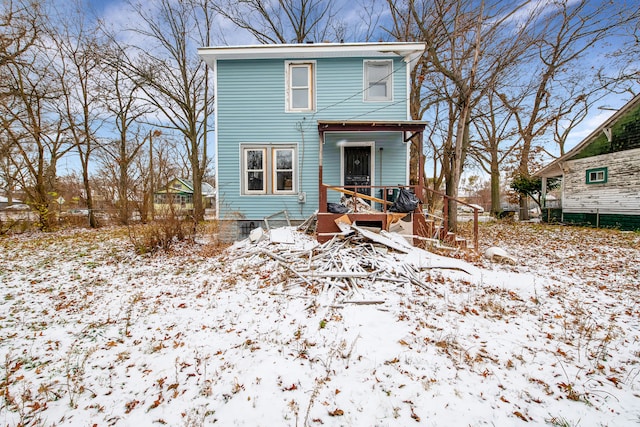 view of snow covered property