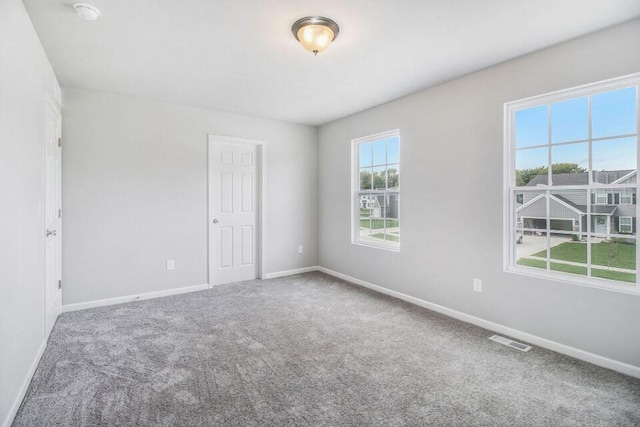 view of carpeted spare room