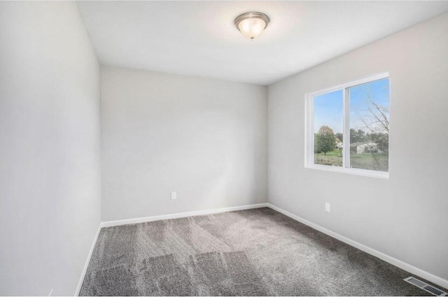 unfurnished room featuring carpet floors