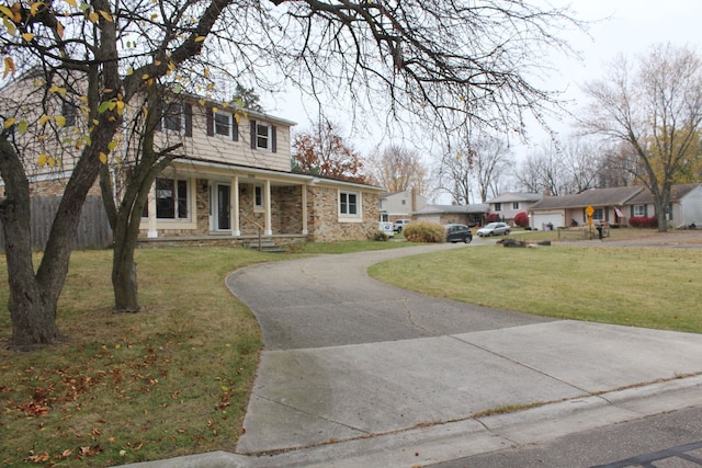 view of front of property with a front lawn