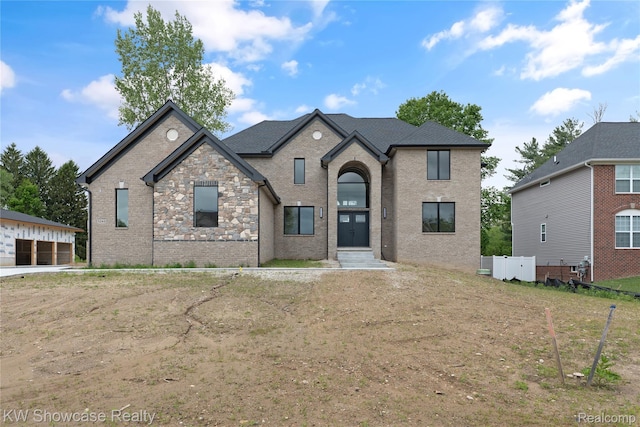 5245 Buell Dr, Commerce Twp, MI 48382 - french provincial home with brick siding