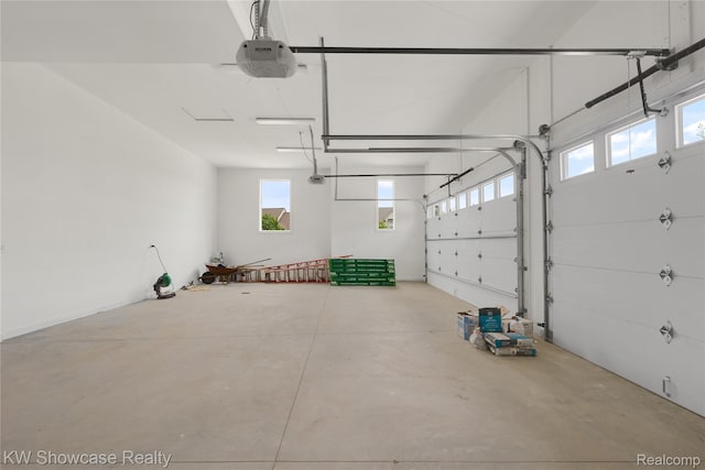 5245 Buell Dr, Commerce Twp, MI 48382 - garage featuring a garage door opener