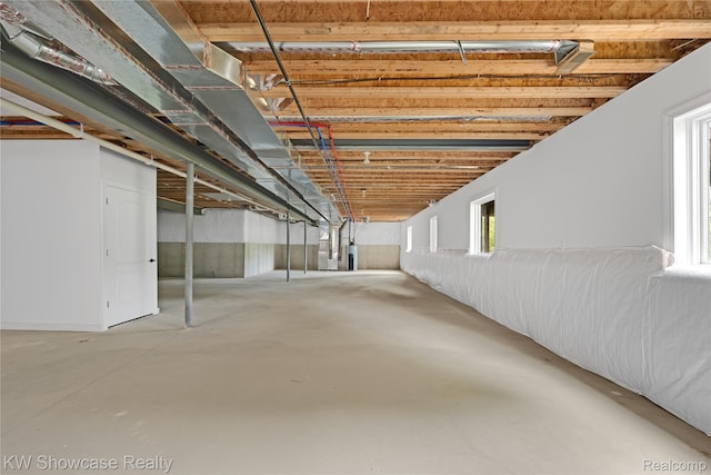 5245 Buell Dr, Commerce Twp, MI 48382 - basement featuring heating unit