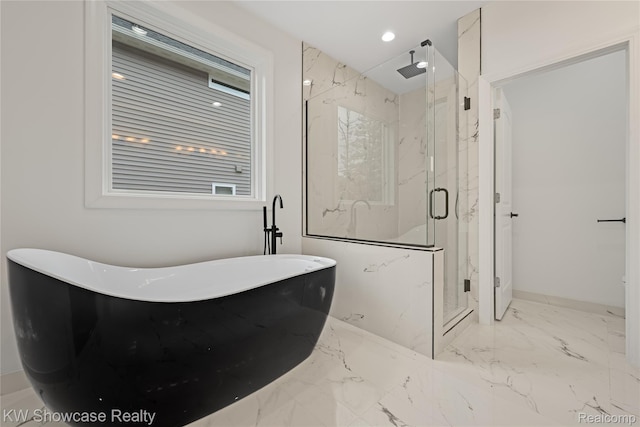 5245 Buell Dr, Commerce Twp, MI 48382 - full bath with a marble finish shower, a freestanding tub, marble tiled flooring, and baseboards