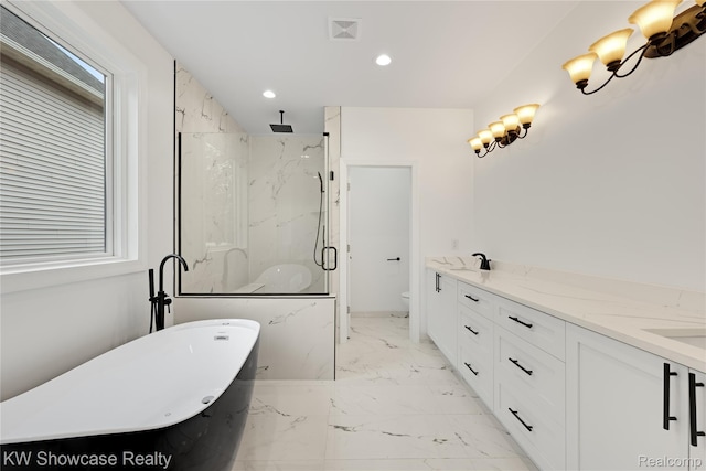 5245 Buell Dr, Commerce Twp, MI 48382 - full bathroom featuring a marble finish shower, marble finish floors, a freestanding tub, recessed lighting, and toilet