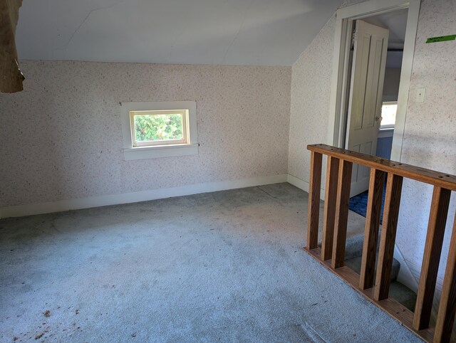 6651 Berrien St E, Eau Claire, MI 49111 - additional living space with carpet floors, wallpapered walls, and baseboards