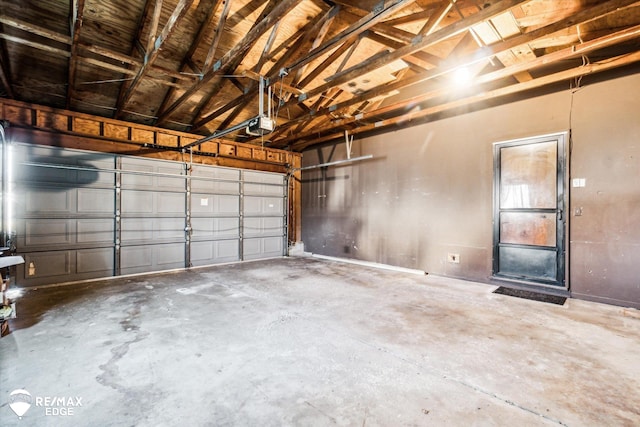 garage featuring a garage door opener