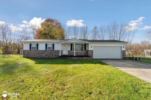 single story home featuring covered porch, a front yard, and a garage