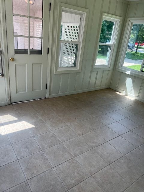 doorway featuring light tile patterned floors