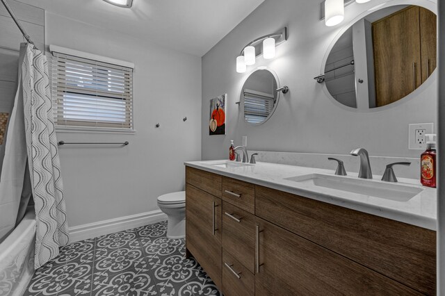 full bathroom with vanity, toilet, shower / bath combo, and tile patterned flooring