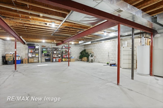 basement featuring water heater