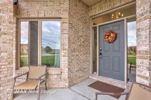 doorway to property with a porch