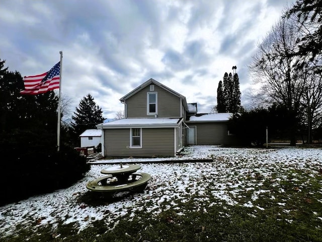 view of snow covered property