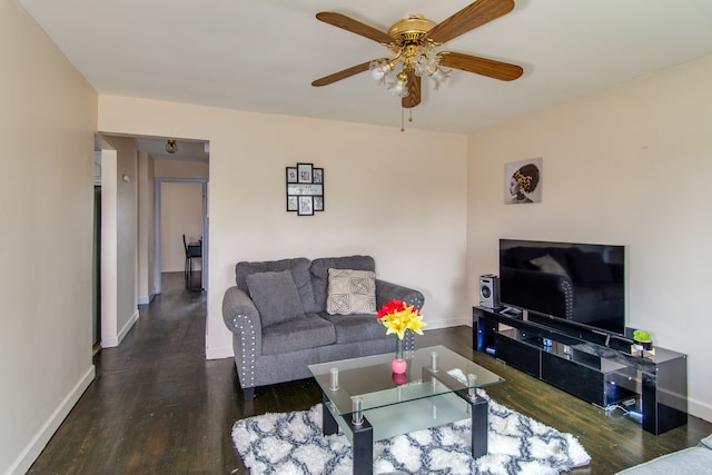 living room featuring dark wood-type flooring