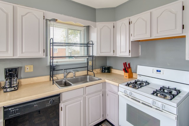 kitchen featuring white cabinets, white gas stove, and dishwasher