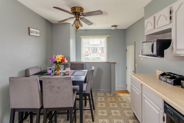 dining space featuring ceiling fan