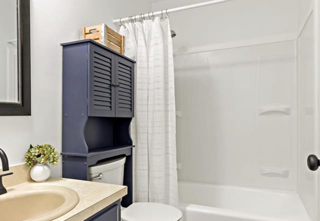 full bathroom with vanity, toilet, and shower / tub combo with curtain