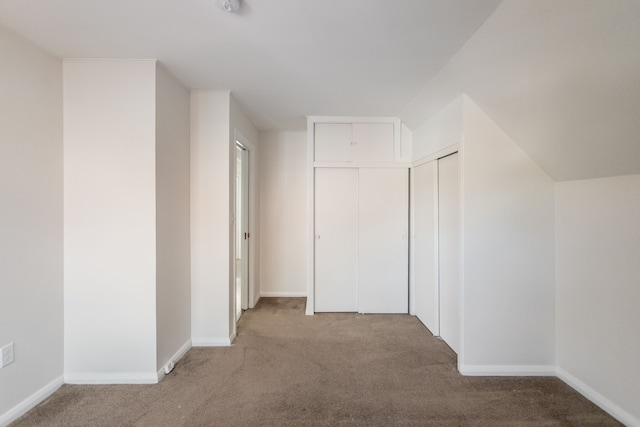 corridor featuring carpet floors