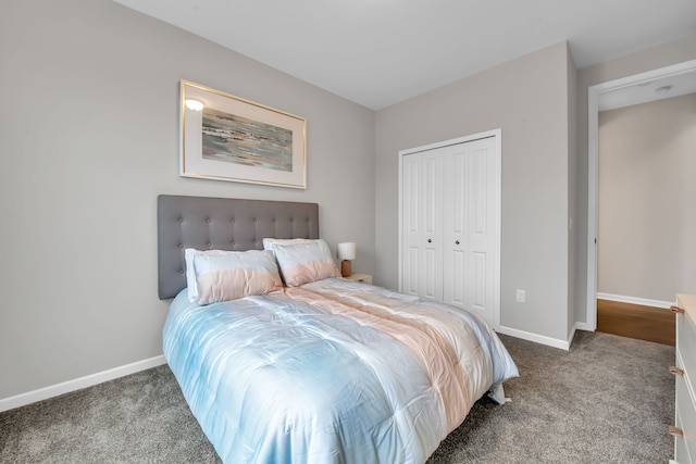 bedroom with carpet and a closet