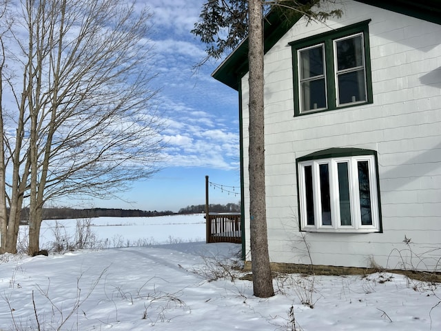 view of snow covered property