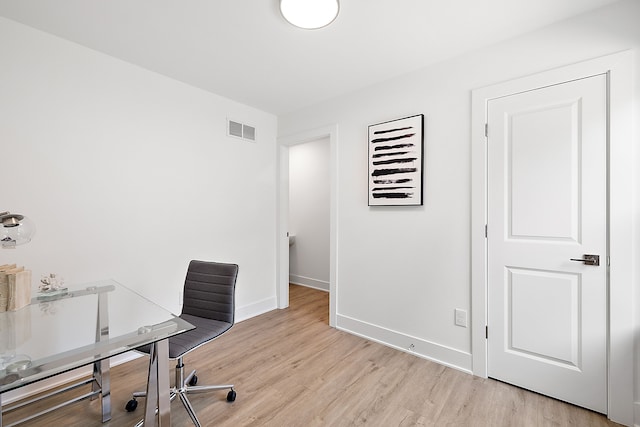 office area with light wood-type flooring