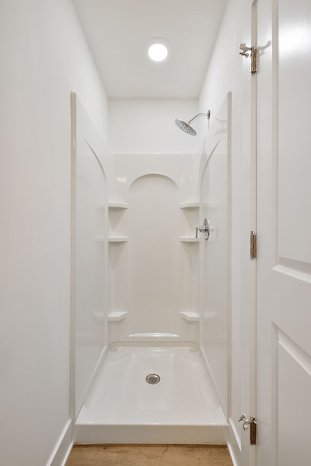 bathroom featuring walk in shower