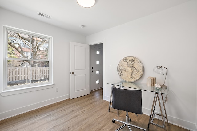 office area with light wood-type flooring