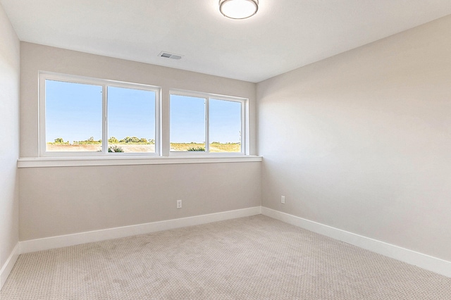 empty room with carpet flooring