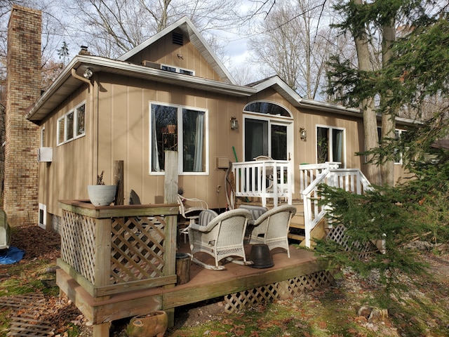 rear view of house with a deck