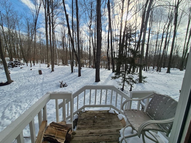 view of snow covered deck