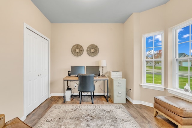 office area with hardwood / wood-style floors