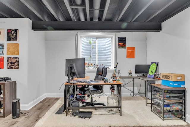 office area with hardwood / wood-style floors