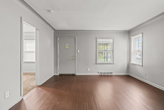 entrance foyer featuring dark wood-type flooring