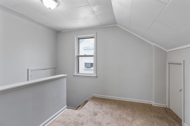 bonus room with carpet and lofted ceiling